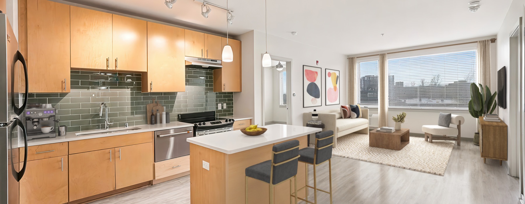 a kitchen with a bar and chairs